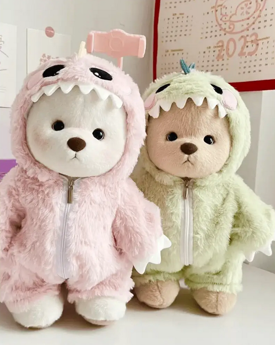 Ours en peluche dinosaure rose